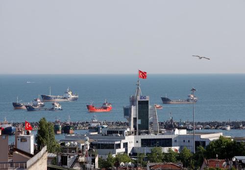 a group of ships in the water near a city at Nanda Hotel in Istanbul