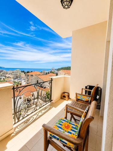a balcony with a view of the city at SeaSideApartamn in Boreti