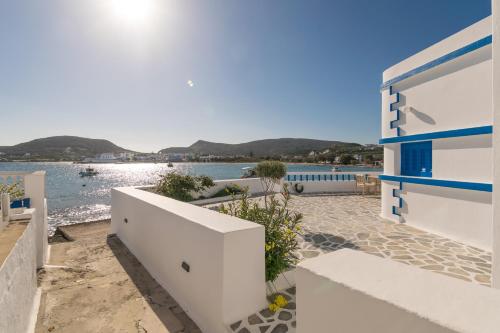 a house with a view of the water at Pera Milos villa in Pollonia
