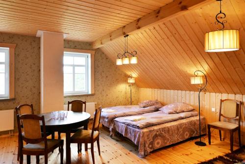 Ένα ή περισσότερα κρεβάτια σε δωμάτιο στο Sunny Beaver B&B