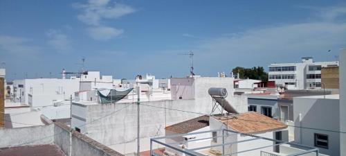 a view of a city from the roof of a building at Casa Fuseta-38 in Fuzeta