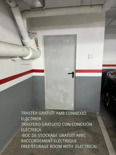 a door in the side of a building with pipes at ACOGEDOR ÁTICO DÚPLEX EN TREMP in Tremp