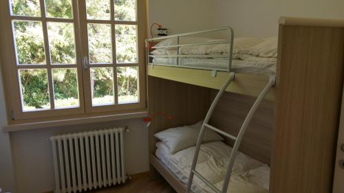 Posteľ alebo postele v izbe v ubytovaní Villa Dina