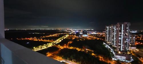 a view of a city at night with lights at Bouncing Fun House in Medini in Iskandar Puteri