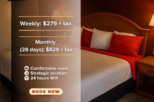 a sign for a hotel room with a bed at Coratel Inn and Suites By Jasper Anthony in Anthony