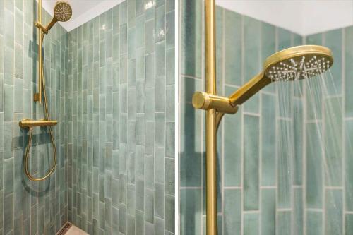 a shower with a shower head in a bathroom at SL343-Slagelse-Bygvangen-7 in Strandlyst