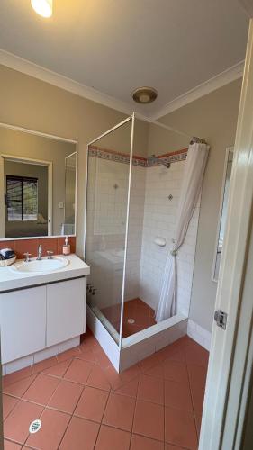 a bathroom with a shower and a sink at Hook Wine & Sinker in Dunsborough