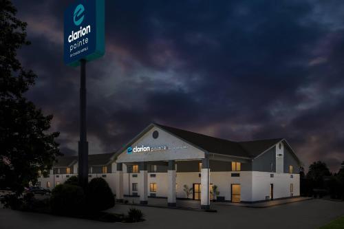 a building with a street sign in front of it at Clarion Pointe Springfield Southeast in Springfield