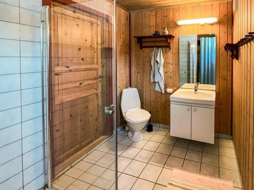 a bathroom with a toilet and a sink at 4 person holiday home in gol in Gol