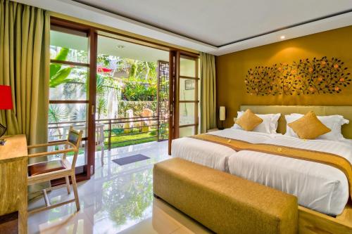 A bed or beds in a room at Labak River Hotel by EPS