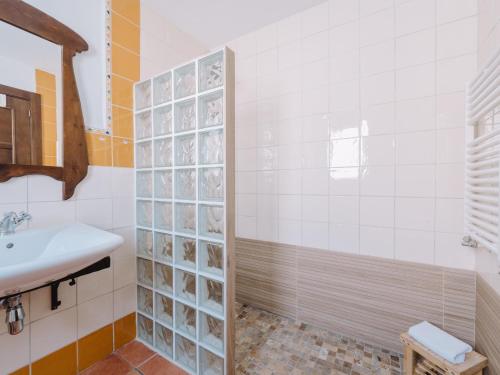 a bathroom with a sink and a shower at Hotel Boutique Cerro del Sol Adults only recommended in Granada