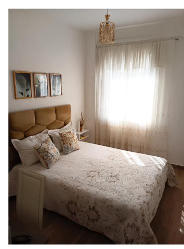 a bedroom with a large bed with a window at Royal Welcome Casanearshore B&B in Casablanca