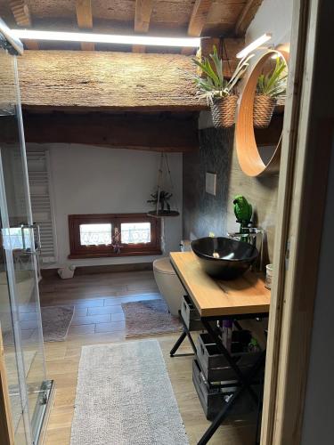 a bathroom with a counter and a sink in a room at B&B Il Castello di Alberico in Cotignola