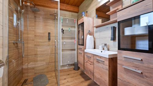 a bathroom with a shower and a sink at Villa Exclusive by Villas Guide in Lepoglava