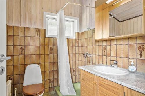 a bathroom with a shower and a sink at LF483-Snedsted-Bjergvej-8 in Snedsted