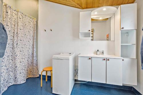 a white bathroom with a sink and a toilet at LF241-Snedsted-Kongens-Borer-10 in Snedsted
