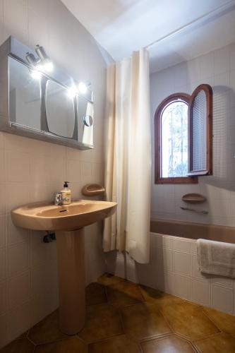 a bathroom with a sink and a shower and a mirror at Javea Vedat by Concept Flats in Jávea
