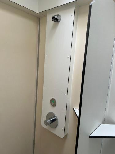 a door with a lock and a metal knob at Camping Suderse - De Protter in Workum