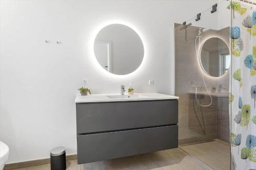 a bathroom with a sink and a mirror at LF143-Vestervig-Gunhildsvej-43 in Vestervig