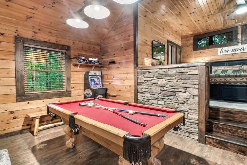 Cute Couples Cabin with Hot Tub Theater Fire Pit photo 15