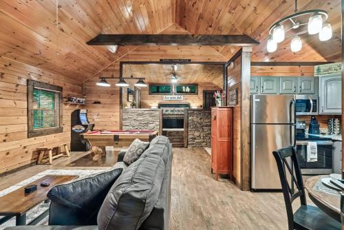 Cute Couples Cabin with Hot Tub Theater Fire Pit photo 9