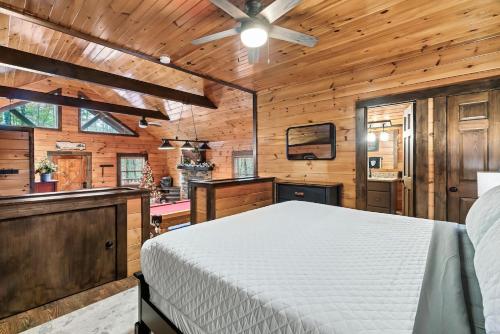 Cute Couples Cabin with Hot Tub Theater Fire Pit photo 23