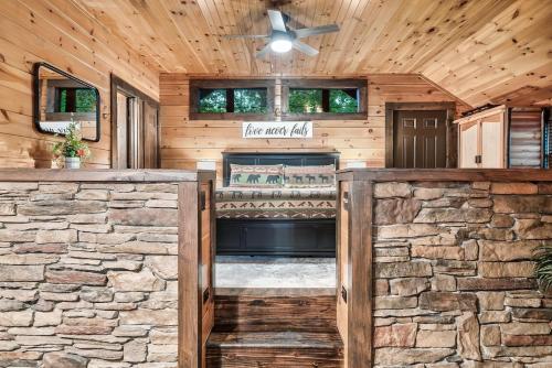 Cute Couples Cabin with Hot Tub Theater Fire Pit photo 22