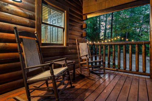 Cute Couples Cabin with Hot Tub Theater Fire Pit photo 18