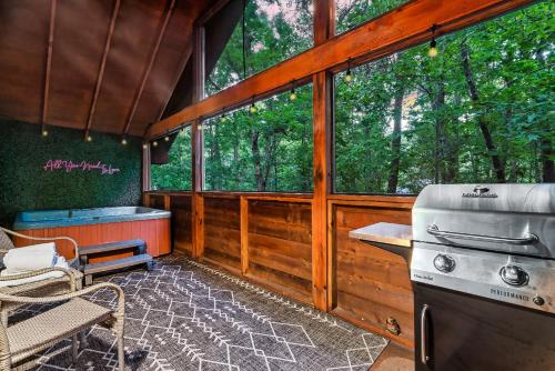 Cute Couples Cabin with Hot Tub Theater Fire Pit photo 21