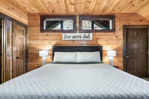 Cute Couples Cabin with Hot Tub Theater Fire Pit photo 6