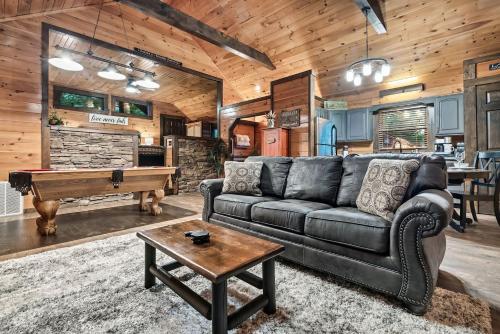 Cute Couples Cabin with Hot Tub Theater Fire Pit photo 11