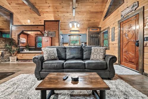 Cute Couples Cabin with Hot Tub Theater Fire Pit photo 10