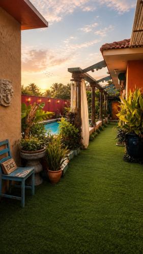 a backyard with a swimming pool and green grass at פלא - PELEH -KASHMIR -Quiet place 3 km from caesarea beach in Or ‘Aqīvāh