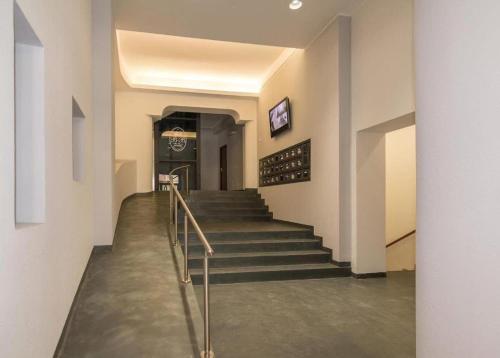 a hallway with stairs in a building at B&B Alla Stazione in Palermo