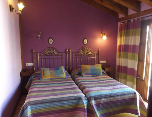 La Fragua de los Alvaro 2 tesisinde bir odada yatak veya yataklar