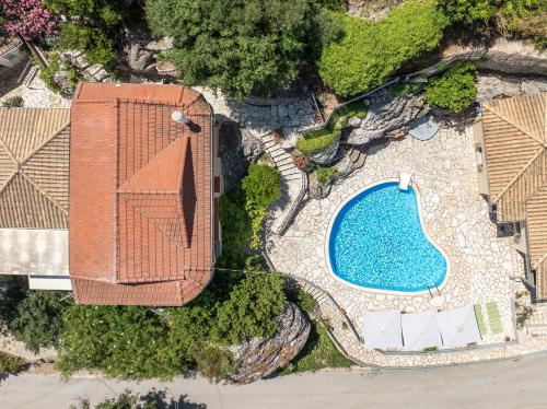 an overhead view of a swimming pool in a resort at Katouna Holidays in Katouna