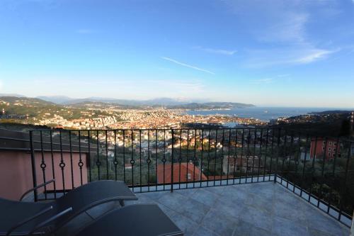 a view of a city from a balcony at La Torretta Rosa in La Spezia