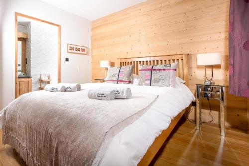 Giường trong phòng chung tại Le Paradis 24 apartment - Chamonix All Year