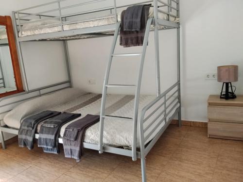 a couple of bunk beds in a room at Gure Bidetxe in San Andrés