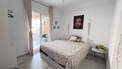 Piscina, playa, terraza y parking en Benalmádena