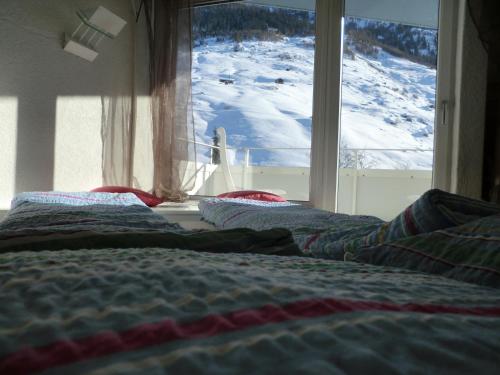 Postel nebo postele na pokoji v ubytování Haus Zervreila