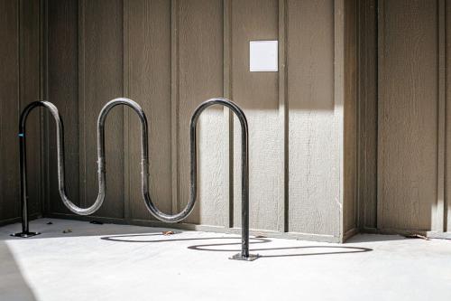 a row of hoses are lined up in a room at Grey Pine Lodge in Waynesboro