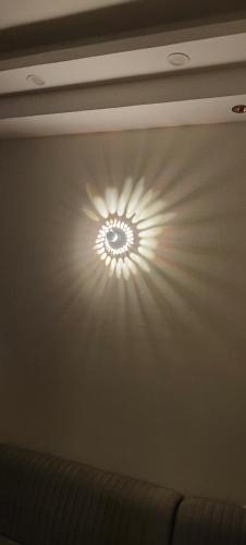 a light on the ceiling of a room at Craviq Hotels -1 in Ghaziabad
