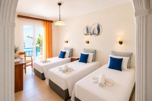 Vuode tai vuoteita majoituspaikassa Karidis Hotel