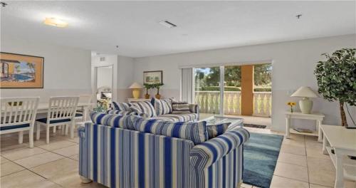 a living room with two couches and a dining room at Nature Lovers Paradise in Inverness