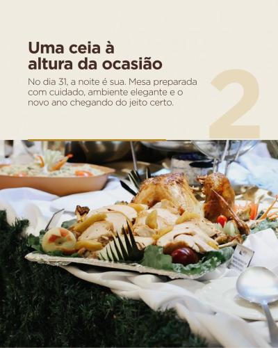 a picture of a plate of food on a table at Laguna Praia Hotel in João Pessoa