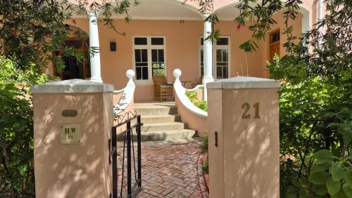 an entrance to a house with a wrought iron gate at Stanford Villa in Stanford