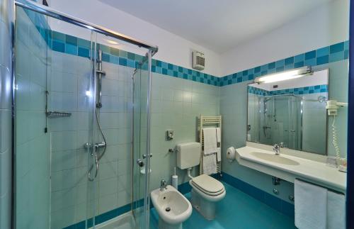 Koupelna v ubytování Hotel Alberi