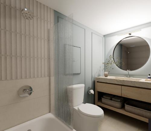 a bathroom with a toilet and a sink and a mirror at The World Of Blue in East Rutherford