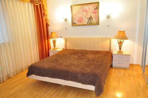 Кровать или кровати в номере Apartment Ex-Visit